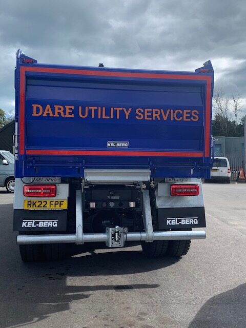 rear of lorry with dare utility services sign